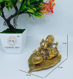 Metal Lord Ganesha on Leaf with Diya Statue For Pooja, Home Décor & Gifts Purpose - Walgrow.com